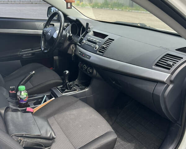 Білий Міцубісі Lancer, об'ємом двигуна 1.5 л та пробігом 190 тис. км за 5700 $, фото 18 на Automoto.ua