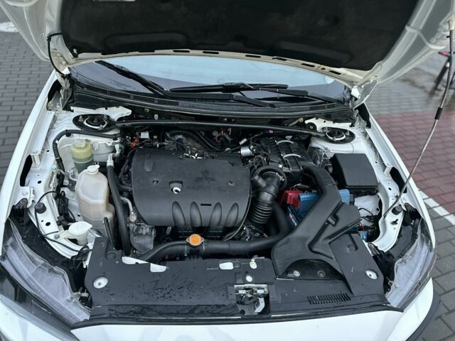 Белый Мицубиси Лансер, объемом двигателя 2 л и пробегом 225 тыс. км за 7800 $, фото 9 на Automoto.ua