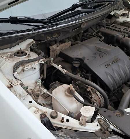 Белый Мицубиси Лансер, объемом двигателя 1.5 л и пробегом 160 тыс. км за 7600 $, фото 17 на Automoto.ua