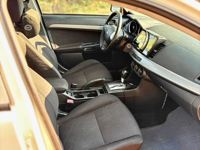 Білий Міцубісі Lancer, об'ємом двигуна 1.5 л та пробігом 171 тис. км за 7000 $, фото 30 на Automoto.ua