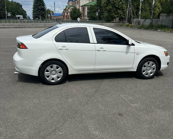 Білий Міцубісі Lancer, об'ємом двигуна 1.5 л та пробігом 190 тис. км за 5700 $, фото 6 на Automoto.ua