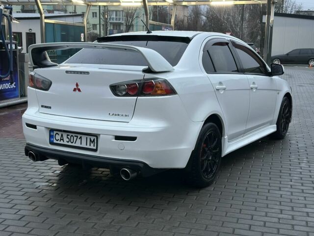 Белый Мицубиси Лансер, объемом двигателя 2 л и пробегом 225 тыс. км за 7800 $, фото 5 на Automoto.ua
