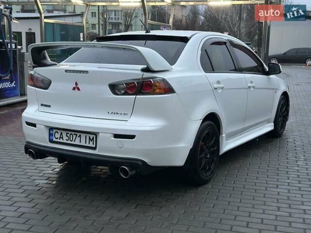 Білий Міцубісі Lancer, об'ємом двигуна 2 л та пробігом 225 тис. км за 7800 $, фото 6 на Automoto.ua