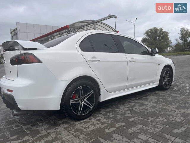 Білий Міцубісі Lancer, об'ємом двигуна 1.6 л та пробігом 231 тис. км за 6900 $, фото 10 на Automoto.ua