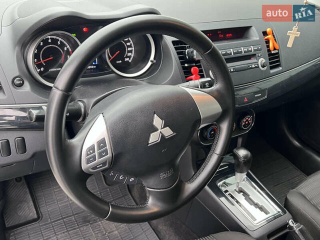 Белый Мицубиси Лансер, объемом двигателя 1.59 л и пробегом 145 тыс. км за 7500 $, фото 16 на Automoto.ua