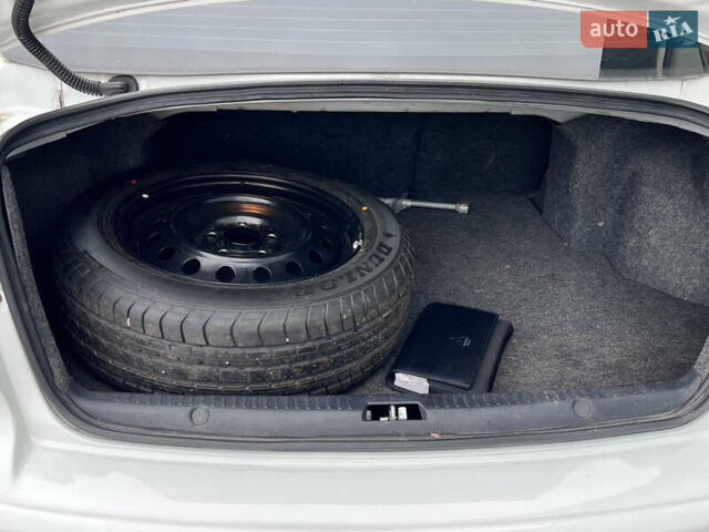 Белый Мицубиси Лансер, объемом двигателя 1.59 л и пробегом 145 тыс. км за 7500 $, фото 22 на Automoto.ua