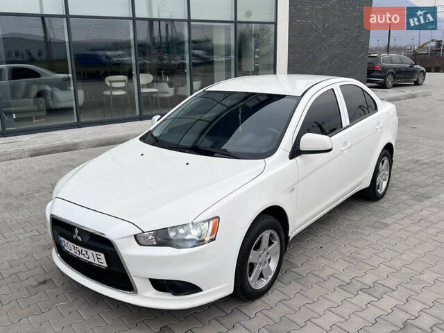 Белый Мицубиси Лансер, объемом двигателя 1.59 л и пробегом 145 тыс. км за 7500 $, фото 7 на Automoto.ua