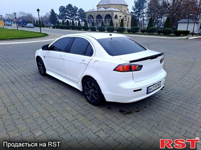 Белый Мицубиси Лансер, объемом двигателя 2 л и пробегом 188 тыс. км за 7700 $, фото 2 на Automoto.ua