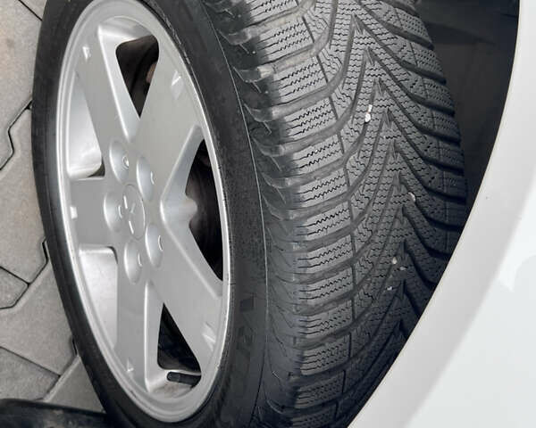 Белый Мицубиси Лансер, объемом двигателя 1.59 л и пробегом 145 тыс. км за 7500 $, фото 12 на Automoto.ua