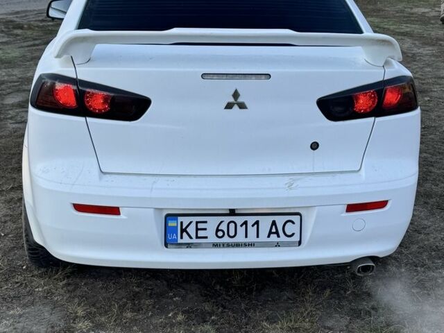 Белый Мицубиси Лансер, объемом двигателя 1.6 л и пробегом 180 тыс. км за 7700 $, фото 5 на Automoto.ua