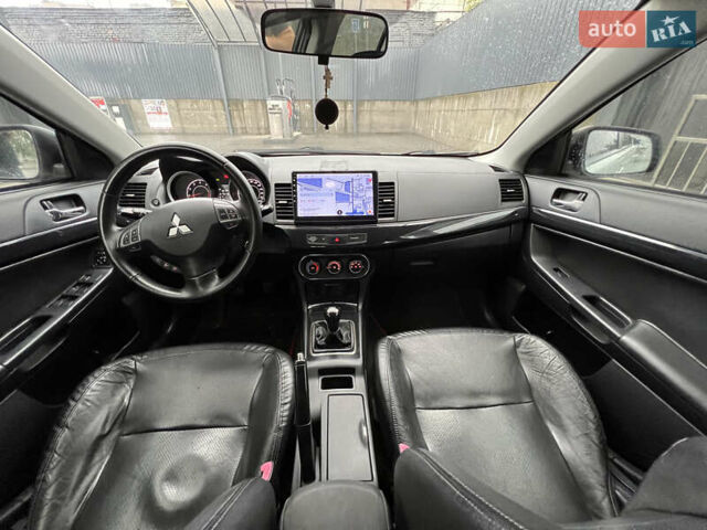 Білий Міцубісі Lancer, об'ємом двигуна 1.6 л та пробігом 231 тис. км за 6900 $, фото 4 на Automoto.ua