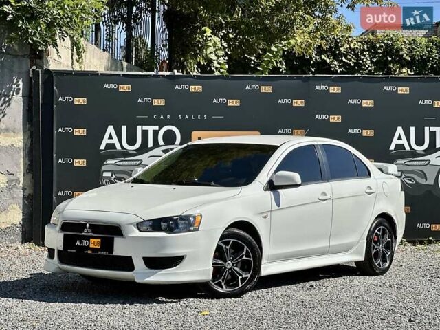 Белый Мицубиси Лансер, объемом двигателя 2 л и пробегом 124 тыс. км за 7700 $, фото 2 на Automoto.ua