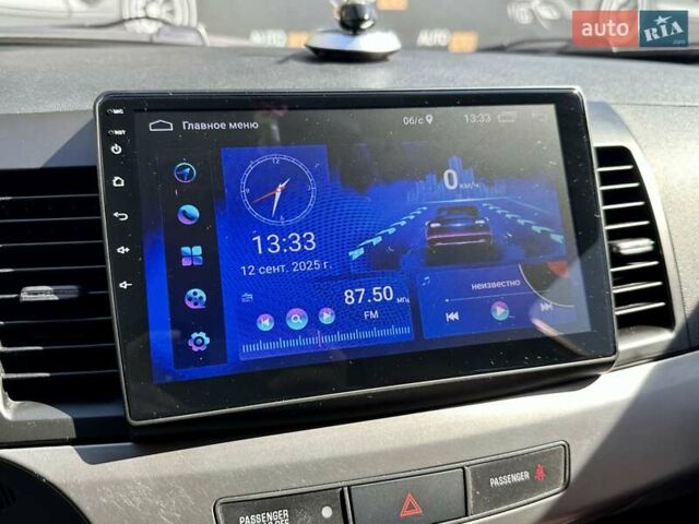 Белый Мицубиси Лансер, объемом двигателя 2 л и пробегом 124 тыс. км за 7700 $, фото 15 на Automoto.ua