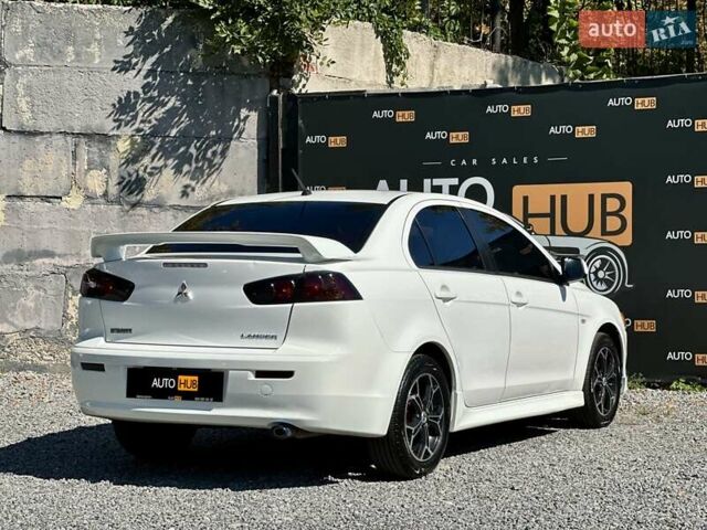 Белый Мицубиси Лансер, объемом двигателя 2 л и пробегом 124 тыс. км за 7700 $, фото 5 на Automoto.ua