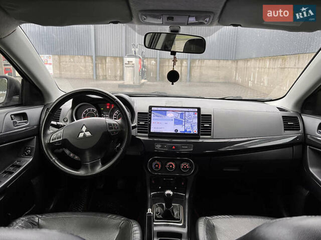 Білий Міцубісі Lancer, об'ємом двигуна 1.6 л та пробігом 231 тис. км за 6900 $, фото 6 на Automoto.ua