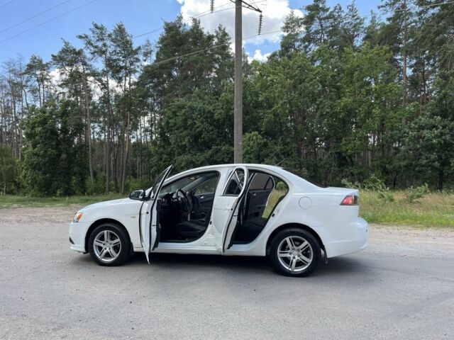 Білий Міцубісі Lancer, об'ємом двигуна 1.6 л та пробігом 225 тис. км за 6700 $, фото 12 на Automoto.ua