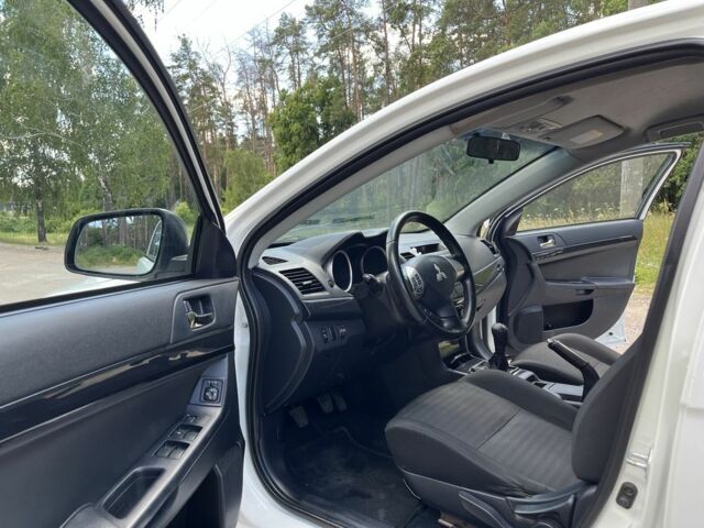 Білий Міцубісі Lancer, об'ємом двигуна 1.6 л та пробігом 225 тис. км за 6700 $, фото 16 на Automoto.ua