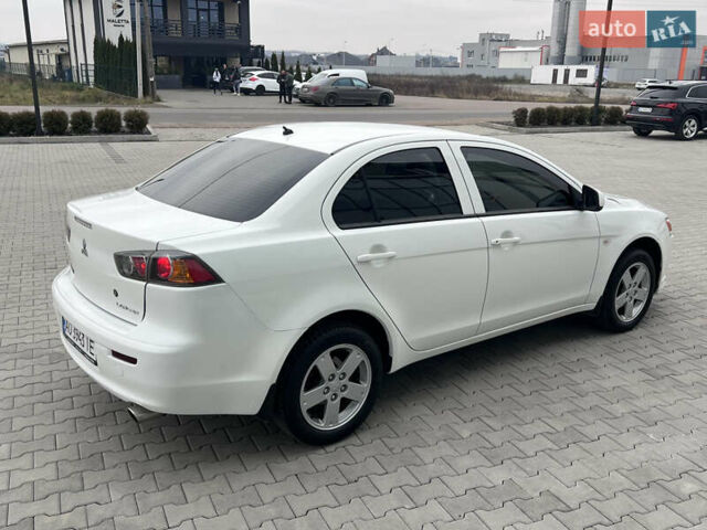 Белый Мицубиси Лансер, объемом двигателя 1.59 л и пробегом 145 тыс. км за 7500 $, фото 9 на Automoto.ua