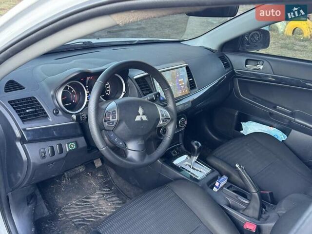 Білий Міцубісі Lancer, об'ємом двигуна 1.6 л та пробігом 180 тис. км за 7500 $, фото 7 на Automoto.ua
