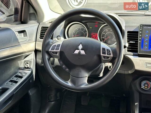 Белый Мицубиси Лансер, объемом двигателя 2 л и пробегом 124 тыс. км за 7700 $, фото 13 на Automoto.ua