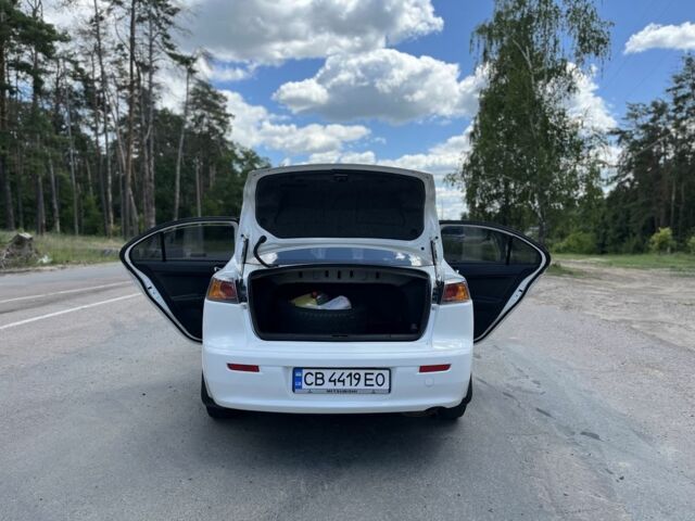Білий Міцубісі Lancer, об'ємом двигуна 1.6 л та пробігом 225 тис. км за 6700 $, фото 15 на Automoto.ua