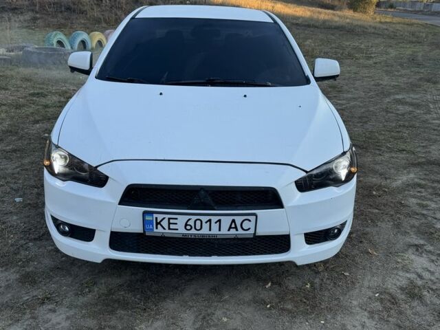 Белый Мицубиси Лансер, объемом двигателя 1.6 л и пробегом 180 тыс. км за 7700 $, фото 2 на Automoto.ua