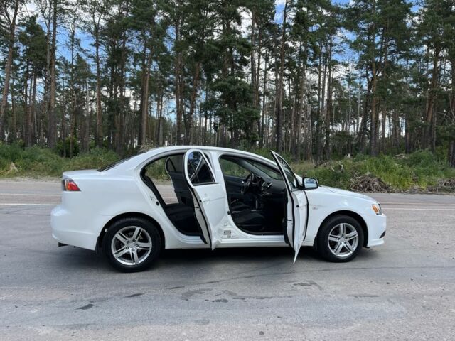 Білий Міцубісі Lancer, об'ємом двигуна 1.6 л та пробігом 225 тис. км за 6700 $, фото 11 на Automoto.ua