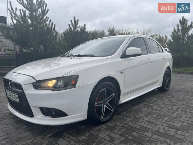 Білий Міцубісі Lancer, об'ємом двигуна 1.6 л та пробігом 231 тис. км за 6900 $, фото 9 на Automoto.ua