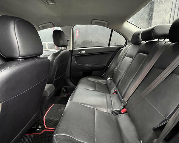 Білий Міцубісі Lancer, об'ємом двигуна 1.6 л та пробігом 231 тис. км за 6900 $, фото 5 на Automoto.ua
