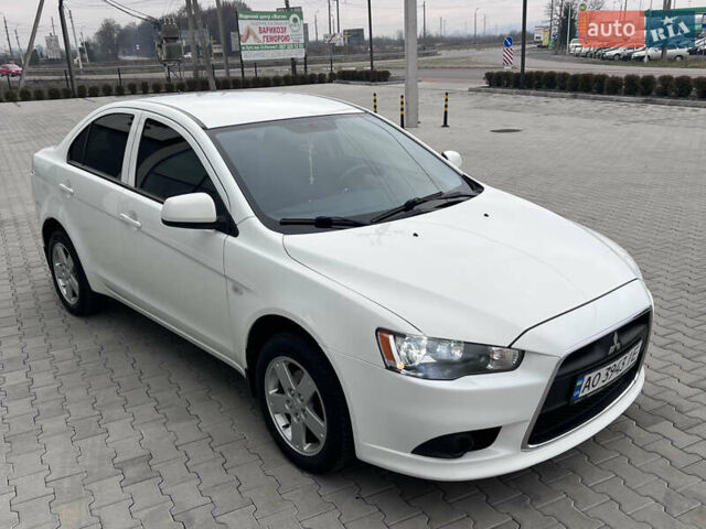 Белый Мицубиси Лансер, объемом двигателя 1.59 л и пробегом 145 тыс. км за 7500 $, фото 8 на Automoto.ua