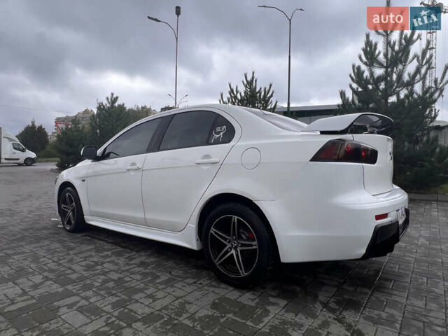 Білий Міцубісі Lancer, об'ємом двигуна 1.6 л та пробігом 231 тис. км за 6900 $, фото 7 на Automoto.ua