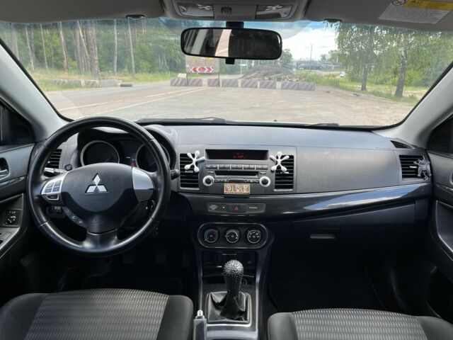 Білий Міцубісі Lancer, об'ємом двигуна 1.6 л та пробігом 225 тис. км за 6700 $, фото 23 на Automoto.ua