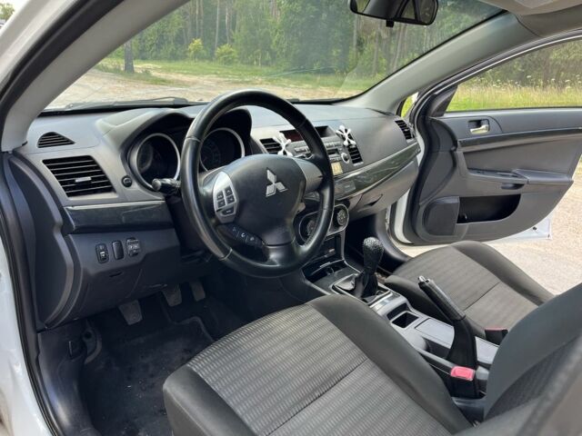 Білий Міцубісі Lancer, об'ємом двигуна 1.6 л та пробігом 225 тис. км за 6700 $, фото 17 на Automoto.ua