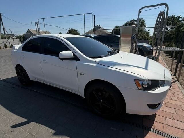 Білий Міцубісі Lancer, об'ємом двигуна 1.59 л та пробігом 182 тис. км за 6900 $, фото 3 на Automoto.ua
