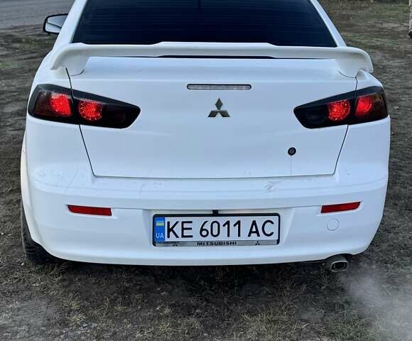 Білий Міцубісі Lancer, об'ємом двигуна 1.6 л та пробігом 180 тис. км за 7500 $, фото 3 на Automoto.ua