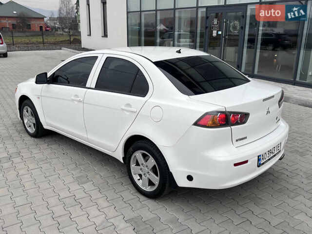 Белый Мицубиси Лансер, объемом двигателя 1.59 л и пробегом 145 тыс. км за 7500 $, фото 10 на Automoto.ua
