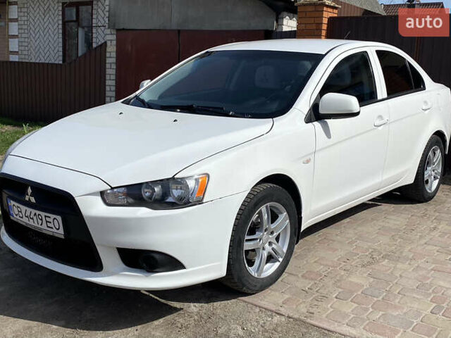 Белый Мицубиси Лансер, объемом двигателя 1.6 л и пробегом 227 тыс. км за 6400 $, фото 1 на Automoto.ua