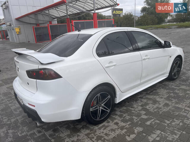 Білий Міцубісі Lancer, об'ємом двигуна 1.6 л та пробігом 231 тис. км за 6900 $, фото 8 на Automoto.ua