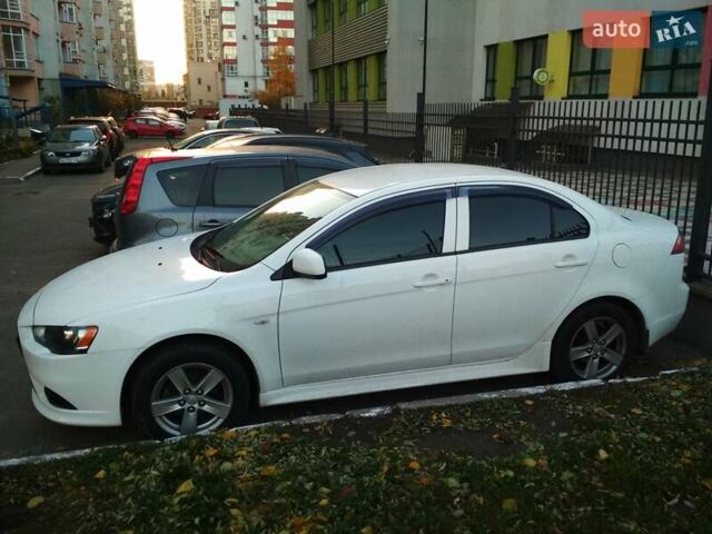 Белый Мицубиси Лансер, объемом двигателя 1.59 л и пробегом 110 тыс. км за 7300 $, фото 1 на Automoto.ua