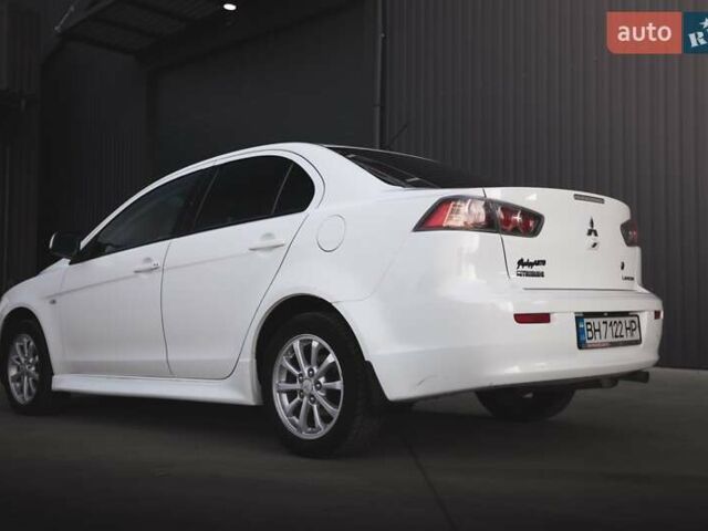 Білий Міцубісі Lancer, об'ємом двигуна 1.6 л та пробігом 247 тис. км за 8200 $, фото 5 на Automoto.ua