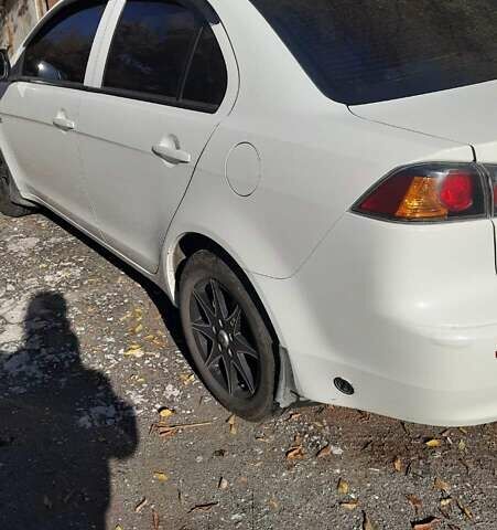 Білий Міцубісі Lancer, об'ємом двигуна 1.6 л та пробігом 113 тис. км за 7300 $, фото 2 на Automoto.ua