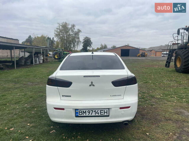 Белый Мицубиси Лансер, объемом двигателя 1.59 л и пробегом 163 тыс. км за 6700 $, фото 6 на Automoto.ua