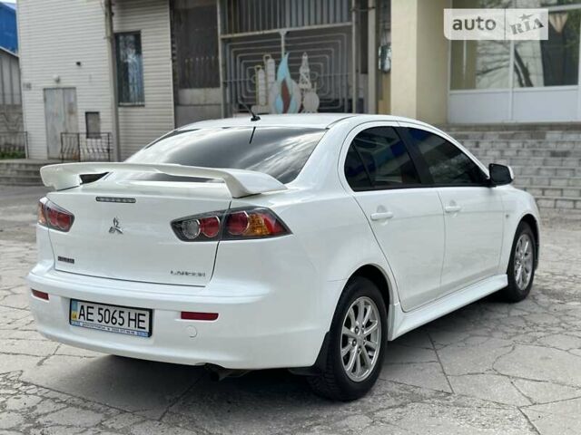 Білий Міцубісі Lancer, об'ємом двигуна 1.58 л та пробігом 99 тис. км за 8500 $, фото 5 на Automoto.ua