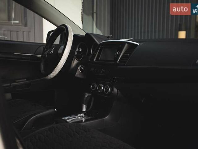 Білий Міцубісі Lancer, об'ємом двигуна 1.6 л та пробігом 247 тис. км за 8200 $, фото 8 на Automoto.ua