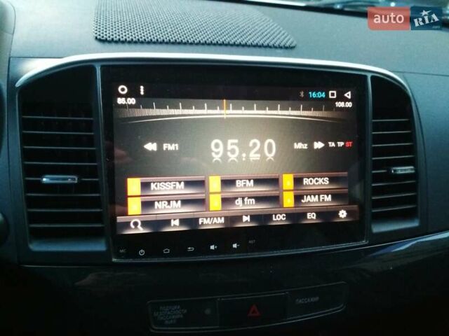 Белый Мицубиси Лансер, объемом двигателя 1.59 л и пробегом 110 тыс. км за 7300 $, фото 9 на Automoto.ua