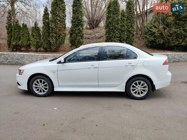 Білий Міцубісі Lancer, об'ємом двигуна 1.6 л та пробігом 68 тис. км за 9500 $, фото 5 на Automoto.ua