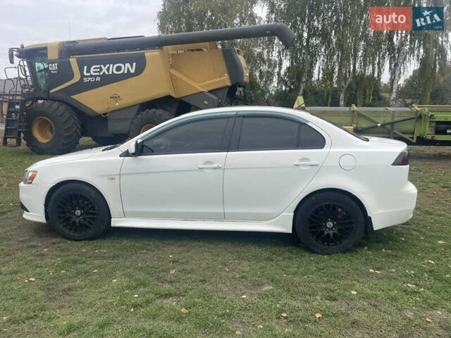 Белый Мицубиси Лансер, объемом двигателя 1.59 л и пробегом 163 тыс. км за 6700 $, фото 2 на Automoto.ua