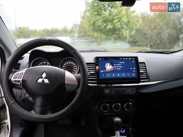 Белый Мицубиси Лансер, объемом двигателя 1.59 л и пробегом 130 тыс. км за 8500 $, фото 41 на Automoto.ua
