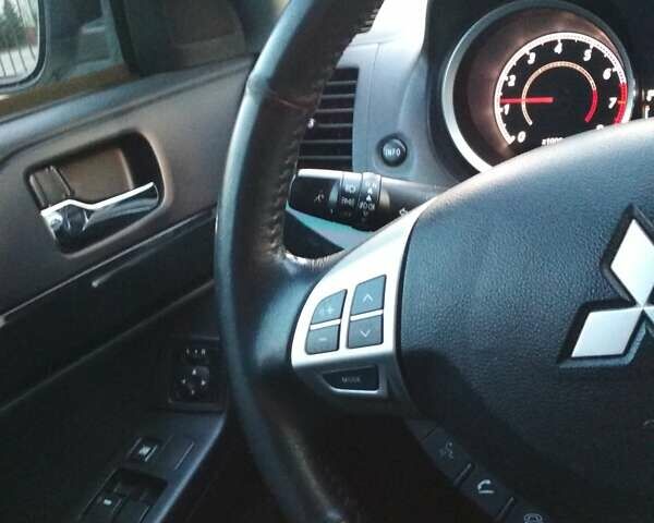 Белый Мицубиси Лансер, объемом двигателя 1.59 л и пробегом 110 тыс. км за 7300 $, фото 10 на Automoto.ua