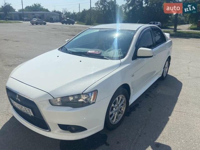Белый Мицубиси Лансер, объемом двигателя 1.6 л и пробегом 238 тыс. км за 8500 $, фото 3 на Automoto.ua